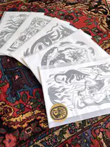 Hand-pulled Moltéa prints in glassine sleeves, sealed with the gold frog sticker